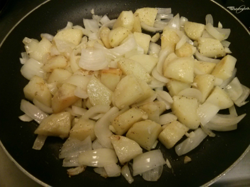 Potatoes, onions and garlic sauteing
