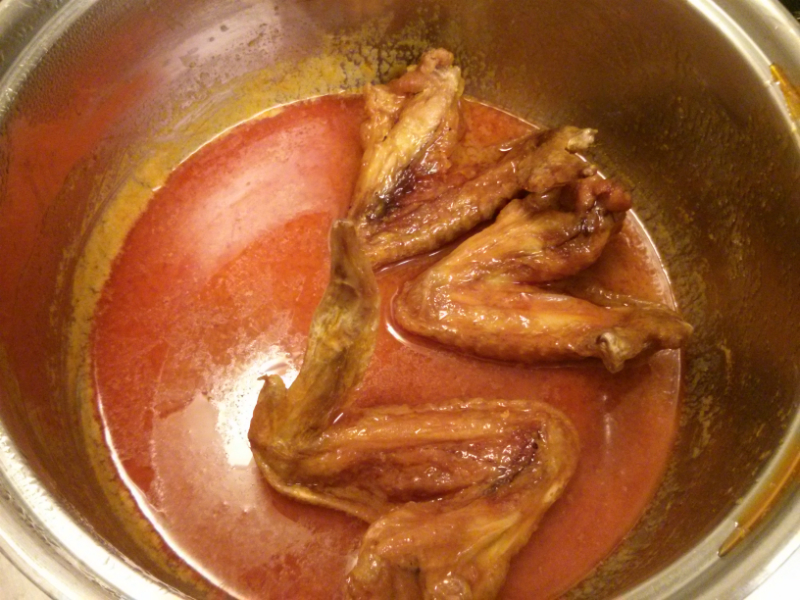Sauce wings completely