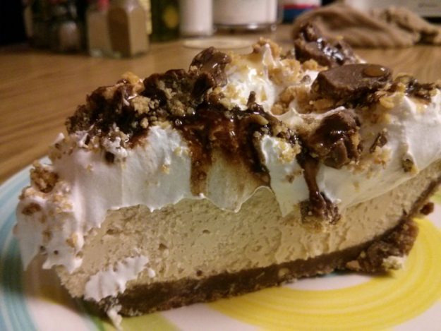 Large slice of Peanut Butter Chocolate Cheesecake
