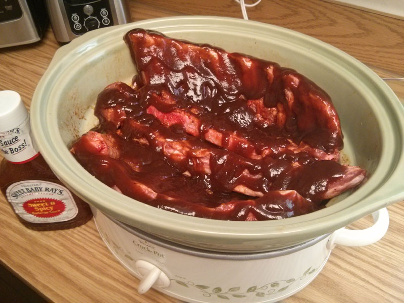 Ribs sauced in crock-pot