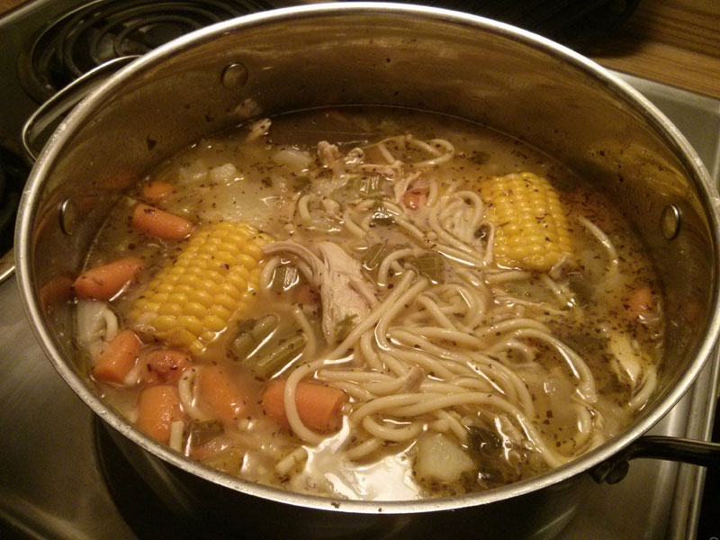 Chicken soup (Caldo de Pollo con Fideos) simmering