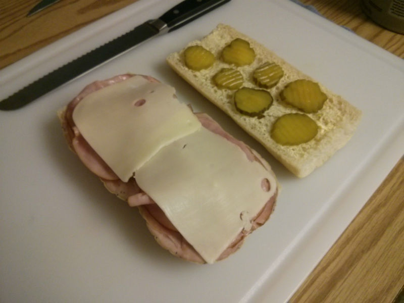 Add ham, cheese and pickles