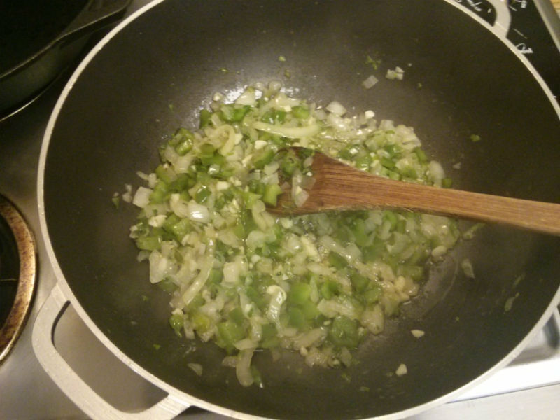 Green pepper, onions and salt sauteing