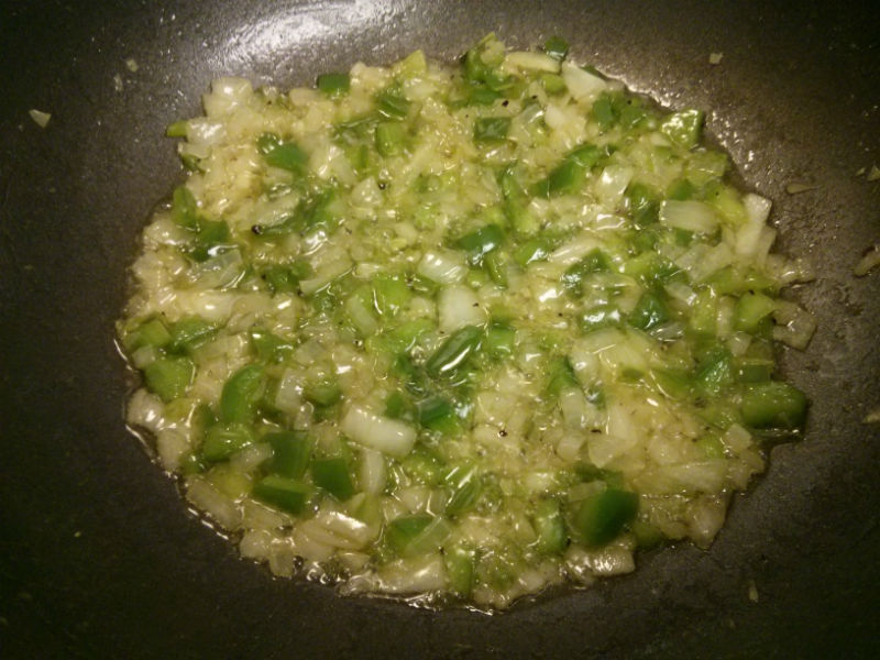 Sauteing green peppers and onions
