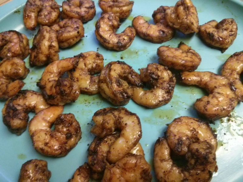 Shrimp grilled and off skewers ready to be served