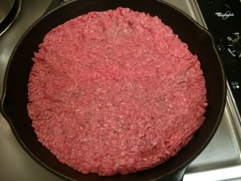 Browning ground beef in large skillet