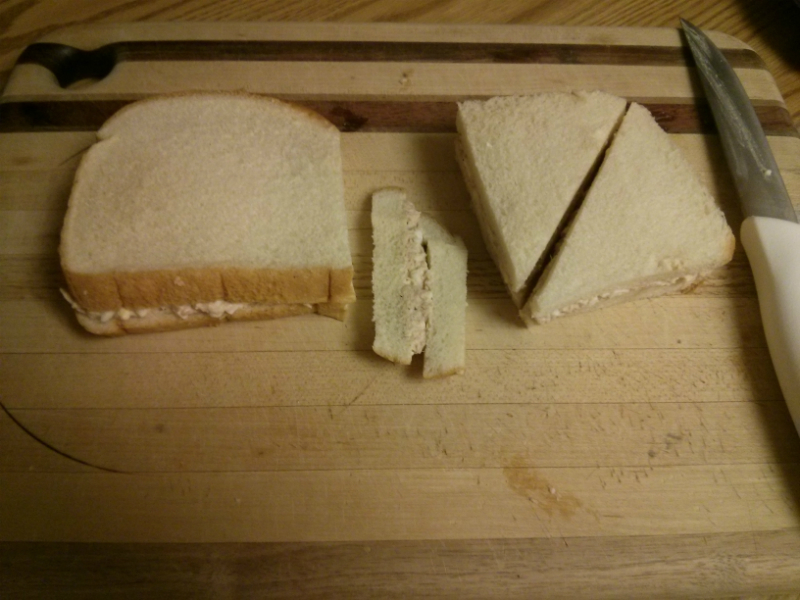 Slice off bread crust with a sharp knife