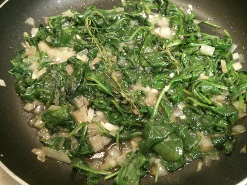 Onions, garlic, spinach, thyme sauteing