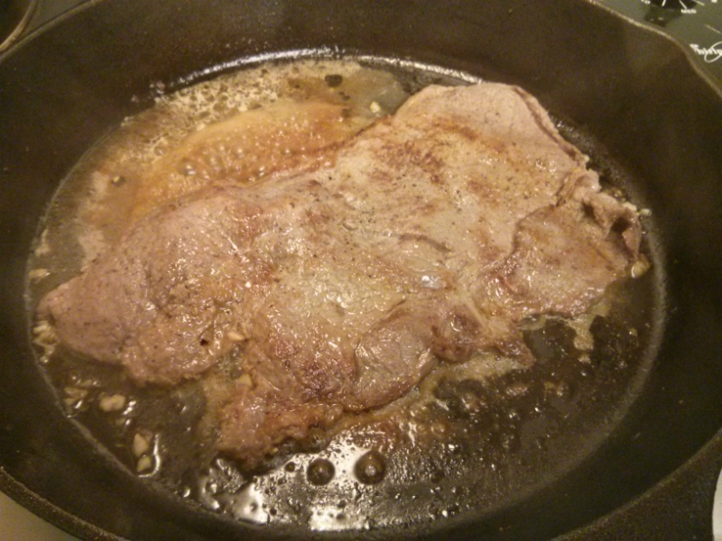 Steak finishing up in some reducing Vino Seco