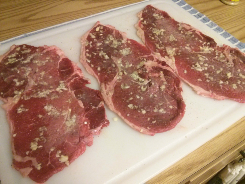 Steaks marinating